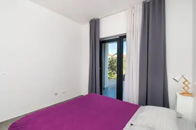 Krevet ili kreveti u jedinici u objektu Apartments Slavica