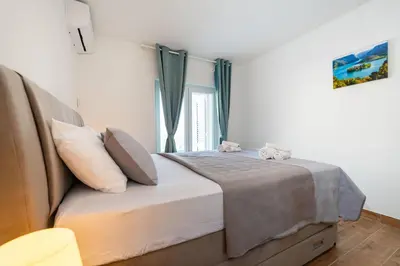 Krevet ili kreveti u jedinici u objektu Apartments Lucija Mari