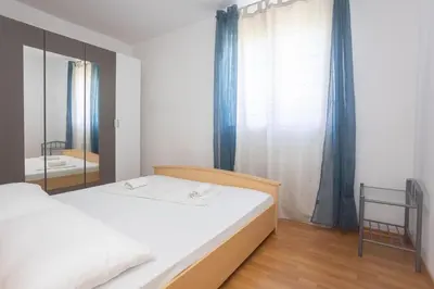 Krevet ili kreveti u jedinici u objektu Apartments Near Hangar beach