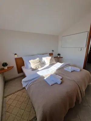 Krevet ili kreveti u jedinici u objektu Breeza Living