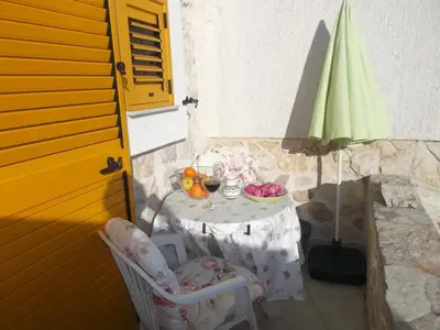 Popločani dio dvorišta ili vanjski dio objekta Apartments Sunce