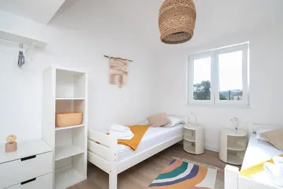 Krevet ili kreveti u jedinici u objektu Apartments Laganini