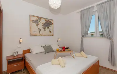 Krevet ili kreveti u jedinici u objektu Gorgeous Home In Rogoznica