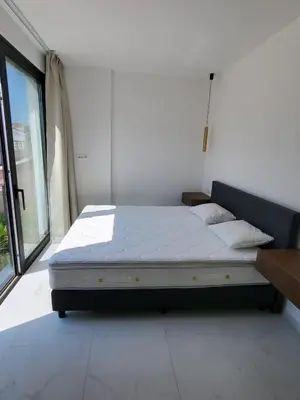 Krevet ili kreveti u jedinici u objektu Breathtaking Seafront Elegance Luxury Penthouse