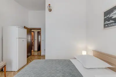 Krevet ili kreveti u jedinici u objektu Seafront apt with terrace 4 bedrooms and mooring
