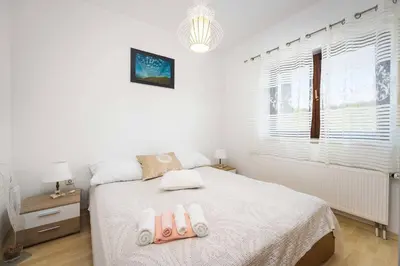 Krevet ili kreveti u jedinici u objektu Cozy Apartment Hortenzija
