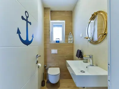 Kupaonica u objektu Villa Violet by Interhome