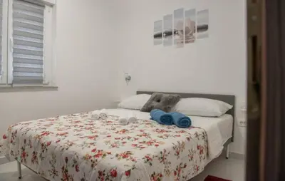Krevet ili kreveti u jedinici u objektu Apartments Marin