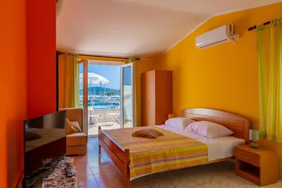 Krevet ili kreveti u jedinici u objektu Apartments Mikulić