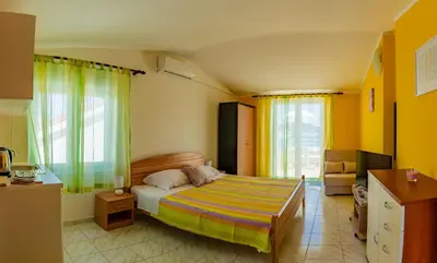 Krevet ili kreveti u jedinici u objektu Apartments Mikulić