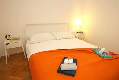 Krevet ili kreveti u jedinici u objektu Central Plaza Residence Šibenik