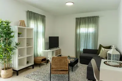 TV i/ili zabavni centar u objektu LUXURY STYLISH APARTMENT BURE
