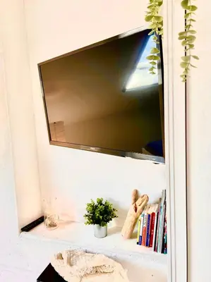 TV i/ili zabavni centar u objektu Apartman Mihaela
