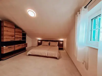 Krevet ili kreveti u jedinici u objektu STONE HOUSE JEZERA