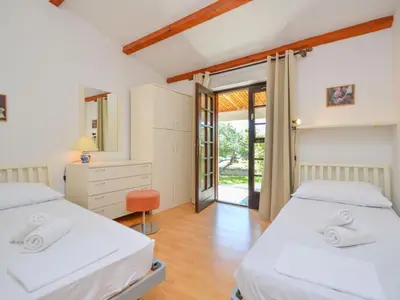 Krevet ili kreveti u jedinici u objektu Holiday Home Karmela by Interhome