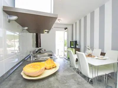 Kuhinja ili čajna kuhinja u objektu Apartment Aquanur-6 by Interhome