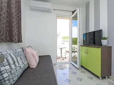 TV i/ili zabavni centar u objektu Apartment Aquanur-6 by Interhome