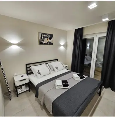 Krevet ili kreveti u jedinici u objektu Apartmani Datea