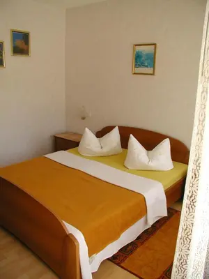 Krevet ili kreveti u jedinici u objektu Rooms Vila Mautner