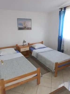 Krevet ili kreveti u jedinici u objektu Bungalow Tribunj