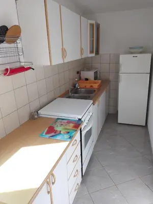 Kuhinja ili čajna kuhinja u objektu Bungalow Tribunj