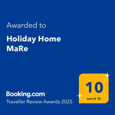 Certifikat, nagrada, logo ili neki drugi dokument izložen u objektu Holiday Home MaRe
