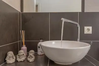 Kupaonica u objektu Apartments Folk