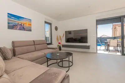 TV i/ili zabavni centar u objektu Villa Elegance Escape