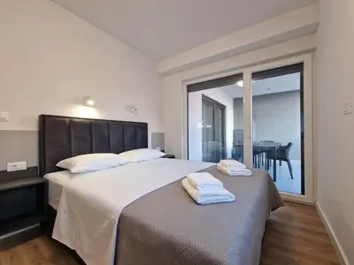 Krevet ili kreveti u jedinici u objektu Apartments OKIT