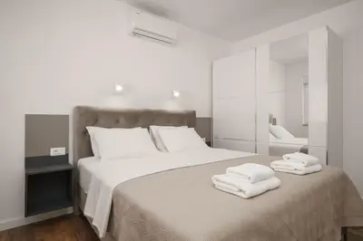 Krevet ili kreveti u jedinici u objektu Apartments OKIT