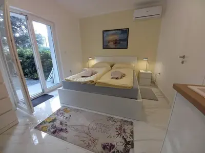 Krevet ili kreveti u jedinici u objektu Olive Garden Studio
