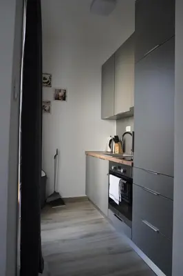 Kuhinja ili čajna kuhinja u objektu Fjaka Apartments & Rooms