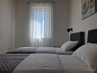 Krevet ili kreveti u jedinici u objektu Apartments Miamare