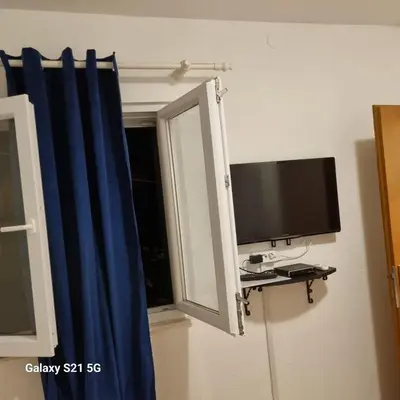 TV i/ili zabavni centar u objektu Apartment Lore