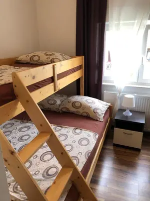 Krevet ili kreveti u jedinici u objektu Tisno Central Apartments