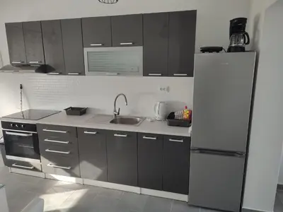 Kuhinja ili čajna kuhinja u objektu Apartmani Tea