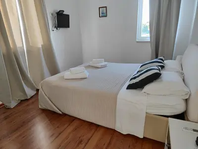 Krevet ili kreveti u jedinici u objektu Guest House Adria