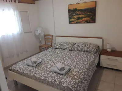 Krevet ili kreveti u jedinici u objektu Robinson house Sea & olives