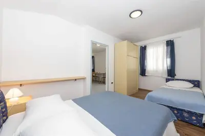 Krevet ili kreveti u jedinici u objektu Apartments Marinko