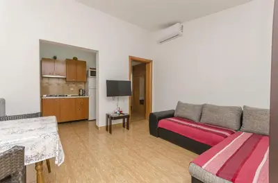 TV i/ili zabavni centar u objektu Apartments Rusan