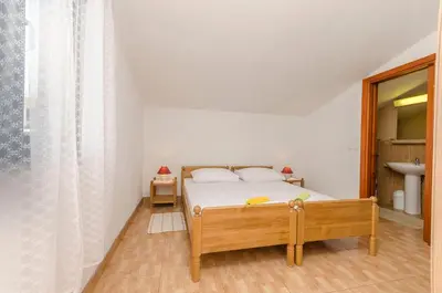 Krevet ili kreveti u jedinici u objektu Apartments Rusan
