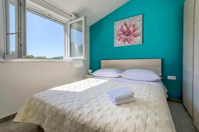 Krevet ili kreveti u jedinici u objektu Apartments Katic