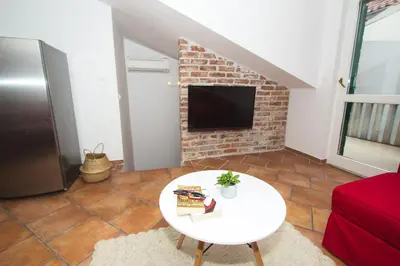 TV i/ili zabavni centar u objektu Jerry & Oli's Apartments