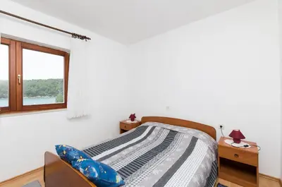 Krevet ili kreveti u jedinici u objektu Apartments Davor