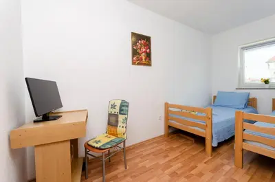TV i/ili zabavni centar u objektu Apartment Orchid