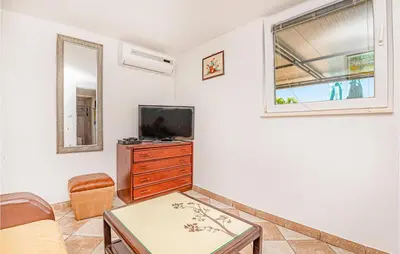 TV i/ili zabavni centar u objektu Holiday Home Zatoglav 1