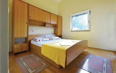 Krevet ili kreveti u jedinici u objektu Holiday Home Razanj 3