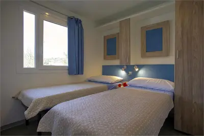 Krevet ili kreveti u jedinici u objektu Mobile Home Luka plaza Slanica, Murter