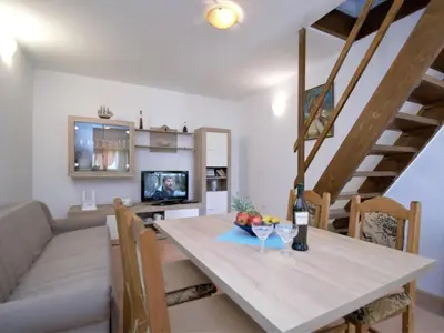 TV i/ili zabavni centar u objektu Holiday Home Aurora by Interhome