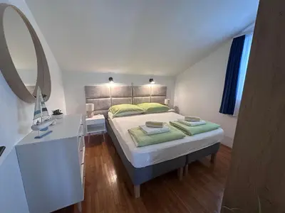 Krevet ili kreveti u jedinici u objektu Apartments Time Off